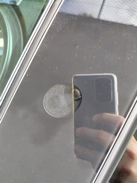 The camera of my Tesla Model Y has condensation inside the left camera