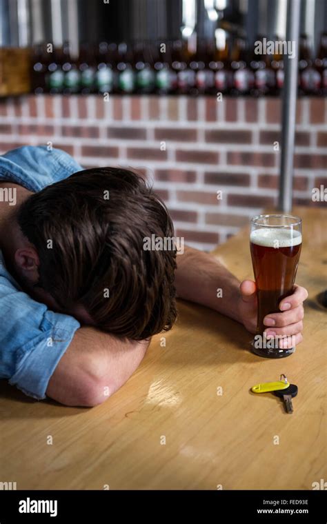 Drunk Man Sleeping At The Bar Stock Photo Alamy