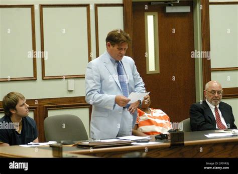 Jeff Burton Looks At His Attorney Mark Bryant As Tamara Caldwell And