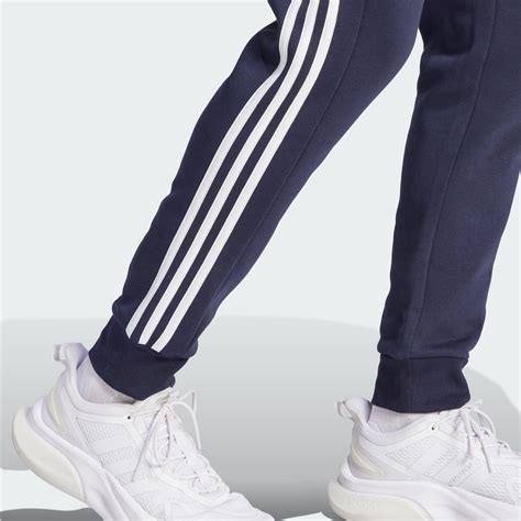 Adidas Essentials Fleece 3 Stripes Tapered Cuff Pants Blue Adidas Uae