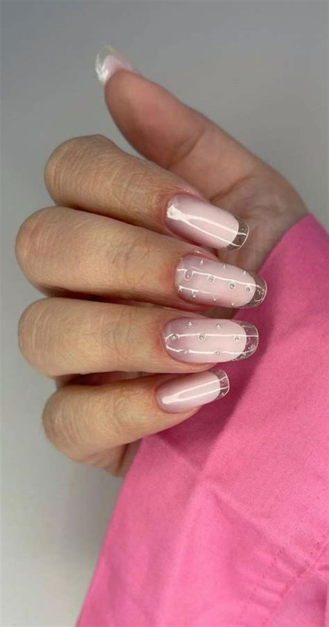 French Glass Nails That Re Sophisticated And Understated Silver Pearl Glass Tips