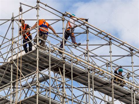 Construction Worker On A Scaffold Stock Photo By ©ginasanders 27312109