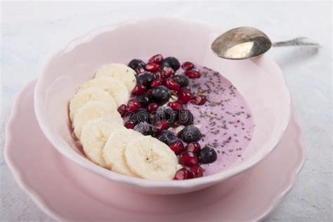 Smoothie Bowl With Banana Blackcurrant Pomegranate Seeds Oatmeal And