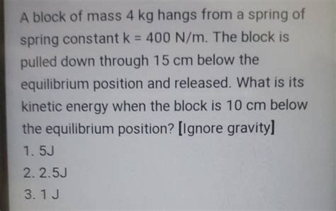 A Block Of Mass 4 Kg Hangs From A Spring Of Spring Constant K 400 N M Th