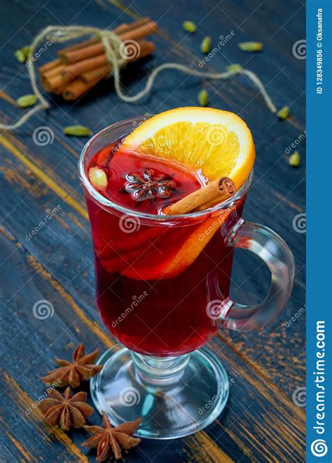 Mulled Wine With Orange Slice And Winter Spices Cinnamon Cardamom And Anise Stars On The