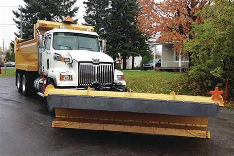 Road-hugging snow plow blade| Concrete Construction Magazine