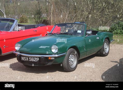 A GREEN TRIUMPH SPITFIRE OPEN TOP GREEN SPORTS CAR Stock Photo Alamy