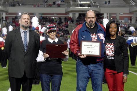 West Brook High School hangs plaque to honor longtime band director