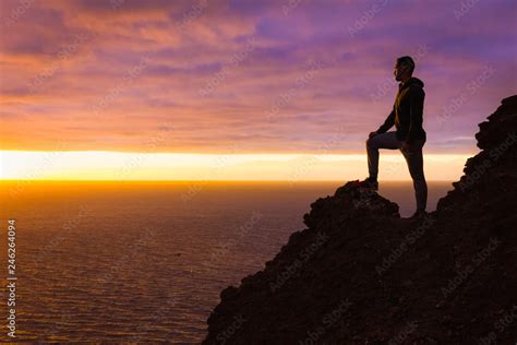 Man On Cliff Edge