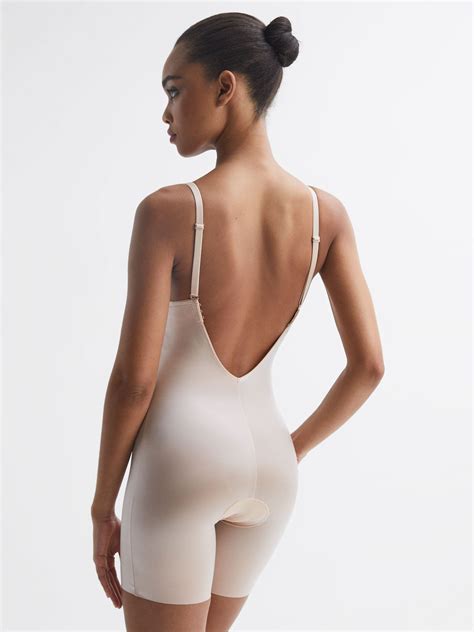 Spanx Shapewear Firming Plunge Low Back Mid Thigh Bodysuit In Champagne Reiss