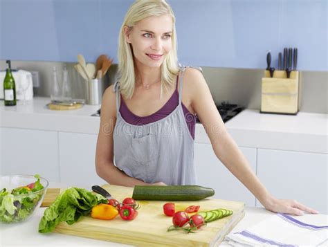 Woman Standing At Kitchen Counter Stock Photo Image Of Napkin Home