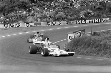 Denny Hulme McLaren M19C Ford Leads Jackie Stewart Tyrrell 003 Ford