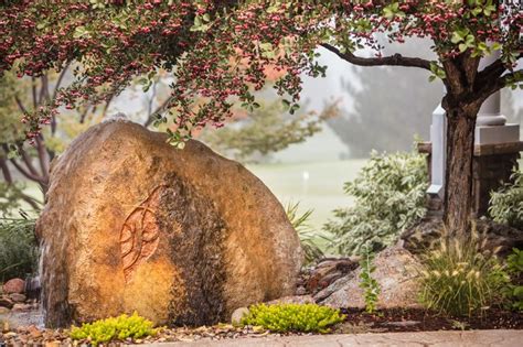 Cored Boulder Water Feature with Logo | Boulders water feature, Water ...