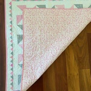 Baby Girl Pinwheel Quilt With Prairie Points And Pink Glittery Backing