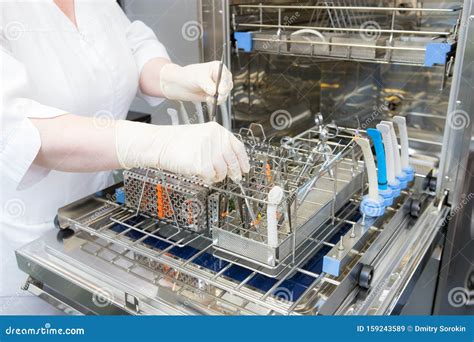 Sterilizing Medical Instruments In Autoclave Dental Office Stock Image