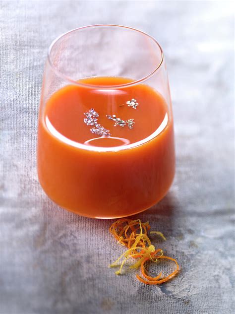 Jus De Carotte a L'orange Et Au Cumin Orange And Tumeric Flavored Carrot Juice Photograph by ...