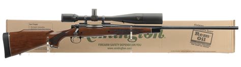 Remington Model 700 Bdl Custom Deluxe Rifle With Box And Scope Rock Island Auction