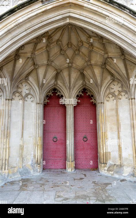 The Entrance Or Main Doors To An Old English Cathedral Designed In The