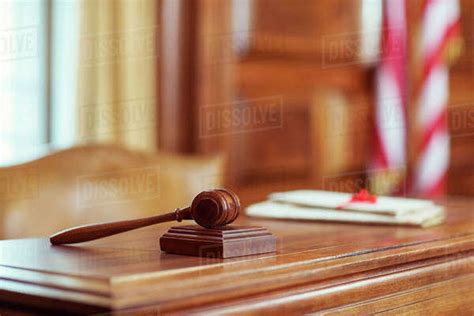 Gavel Laying On Judges Bench In Courtroom Stock Photo Dissolve