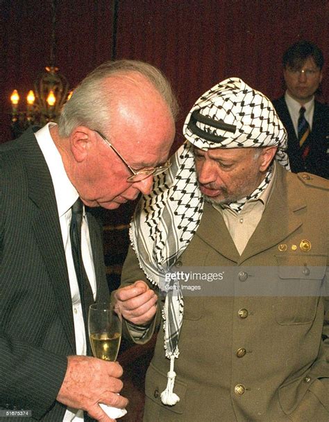 Palestinian Leader Yasser Arafat Talks With Israeli Prime Minister