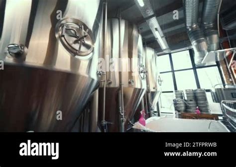 Large Steel Tanks With Beer In Industrial Brewery Plant Stainless