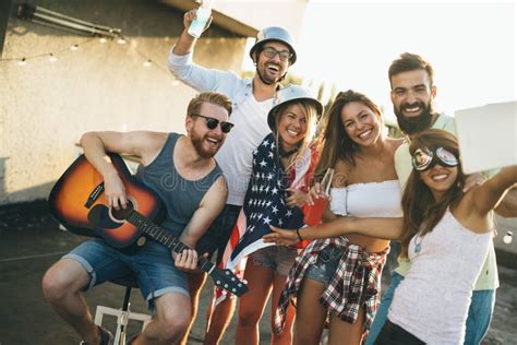 Group of Happy Friends Having Party on Rooftop Stock Image - Image of ...