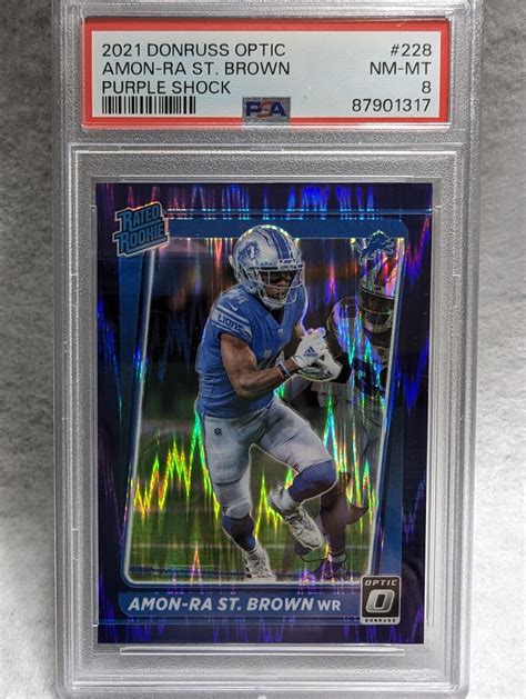 Amon Ra St Brown Donruss Optic Purple Shock Rated Rookie Psa