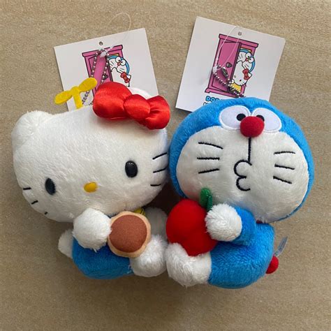 全新日本限定 Hello Kitty X Doraemon Crossover公仔一對 興趣及遊戲 玩具 And 遊戲類 Carousell