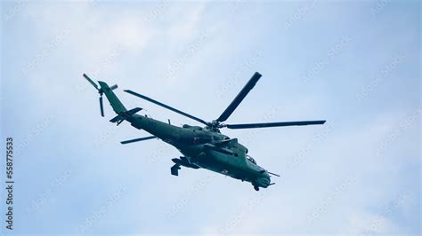 Combat helicopter MI-24 in the sky Stock Photo | Adobe Stock