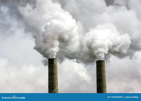 Coal Power Plant Smokestacks Emitting Pollution Into Atmosphere Stock