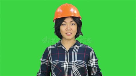 Female Engineer Correct Parts Of An Object Using Remote Controller On A