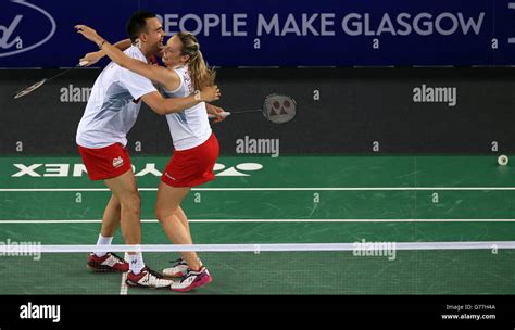 gabrielle adcock  chris adcock celebrate winning  game