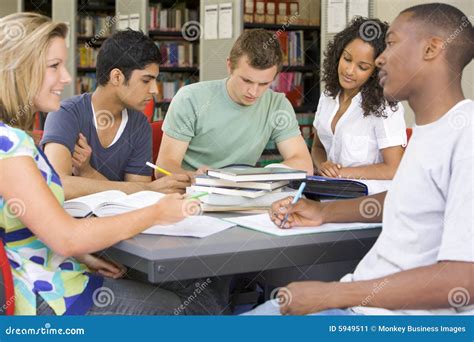 College Students Studying Together In A Library Stock Image Image Of