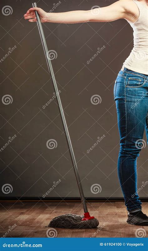 Legs Of Cleaning Woman Holds Old Mop Stock Photo Image Of