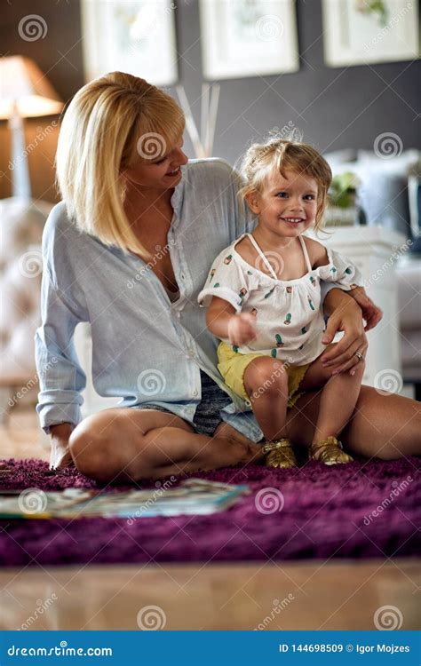 Daughter Sitting In Mom`s Lap Stock Image Image Of Lifestyle Mother