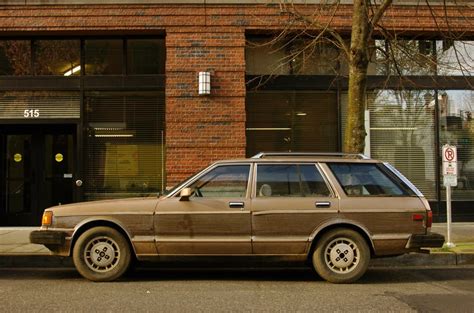 Old Parked Cars Woodgrain Wagon 1983 Nissan Maxima Diesel