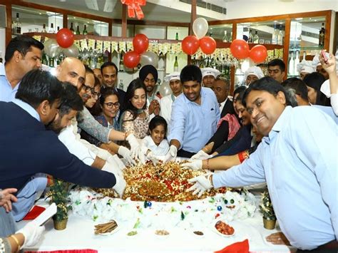 Students Along With Teachers Made The Cake Mixing Ceremony Special