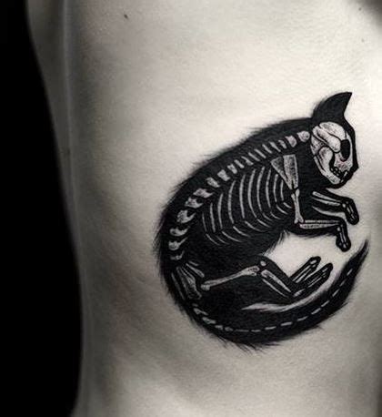 Accurate painted black ink side tattoo of cat skeleton - Tattooimages.biz