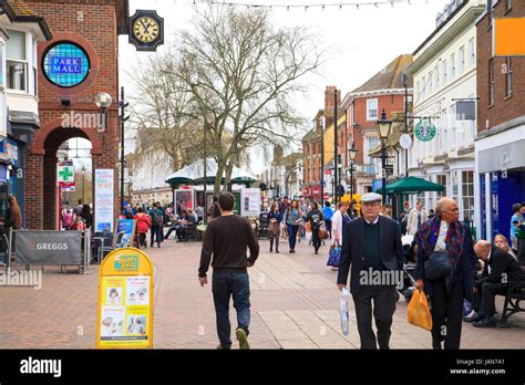 Ashford Town Centre People Enjoying A Day Out Shopping High Street