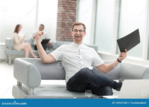 Happy Businessman Sitting in the Lobby of the Bank Stock Photo - Image of copyspace, eyeglasses ...