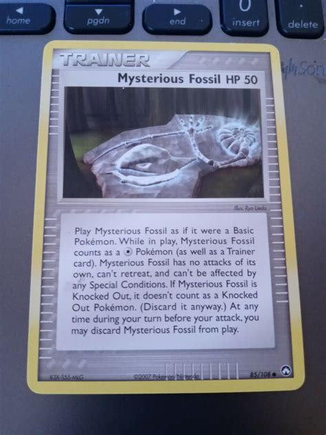 Mavin Pokemon Trainer Card Mysterious Fossil