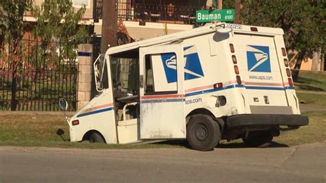 Postal worker dead after driver hits truck, pushes it into ditch