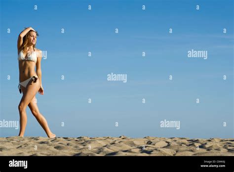 Woman In Bikini Walking At The Beach Stock Photo Alamy