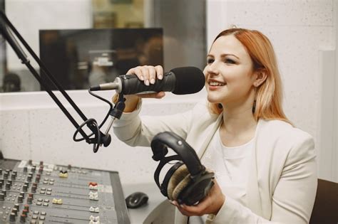 Free Photo Female Host Communicating On Microphone Woman In Radio