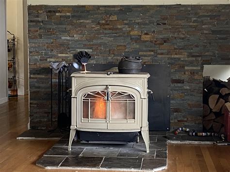 Installed this Vermont Castings “Encore Defiant”, built the hearth and ...