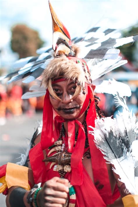 A Person Wearing Red Costume · Free Stock Photo