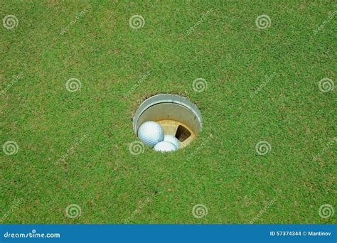 Golf Balls Inside The Hole Stock Photo Image Of Golfing 57374344