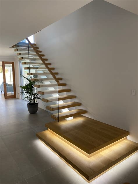 ByFinesse floating stairs with lighting and glass balustrade