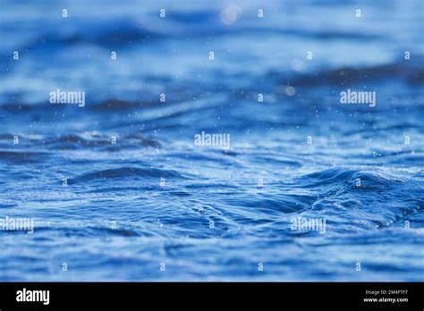 Blue ocean water background Stock Photo - Alamy