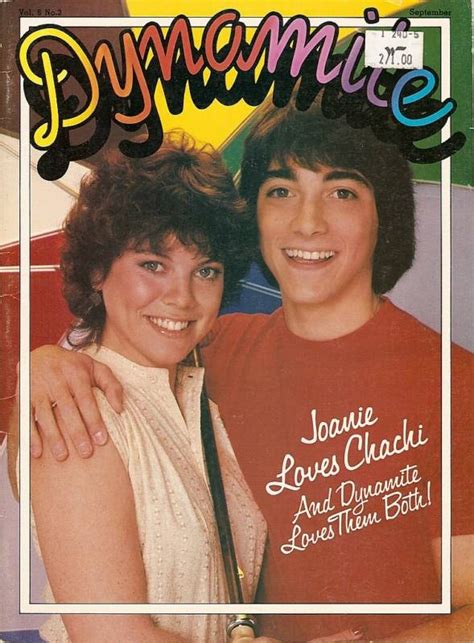 A Magazine Cover With Two People On The Front And One Is Smiling At The